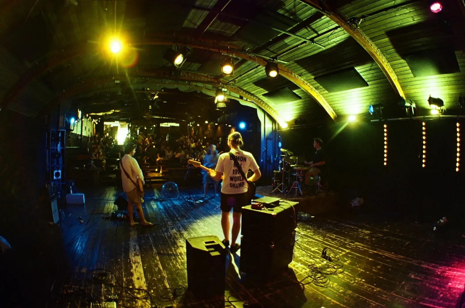 View from the stage past the bassist of Hannetones to the audience at Loď Tajemství